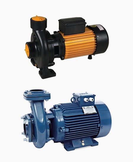 Two industrial centrifugal pumps - black and orange pump on top, blue pump below